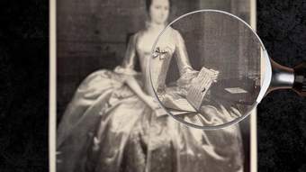 A blurred 1750 painting with a magnifying glass showing an in focus section