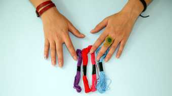 Photograph of making a friendship bracelet 