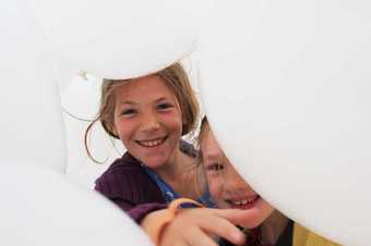 Schoolchildren enjoying Martin Creed Half the Air in a Given Space 2011 at the Tate St Ives Summer Exhibition © Tate