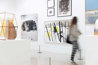 a person stands to look at a display in Tate St Ives